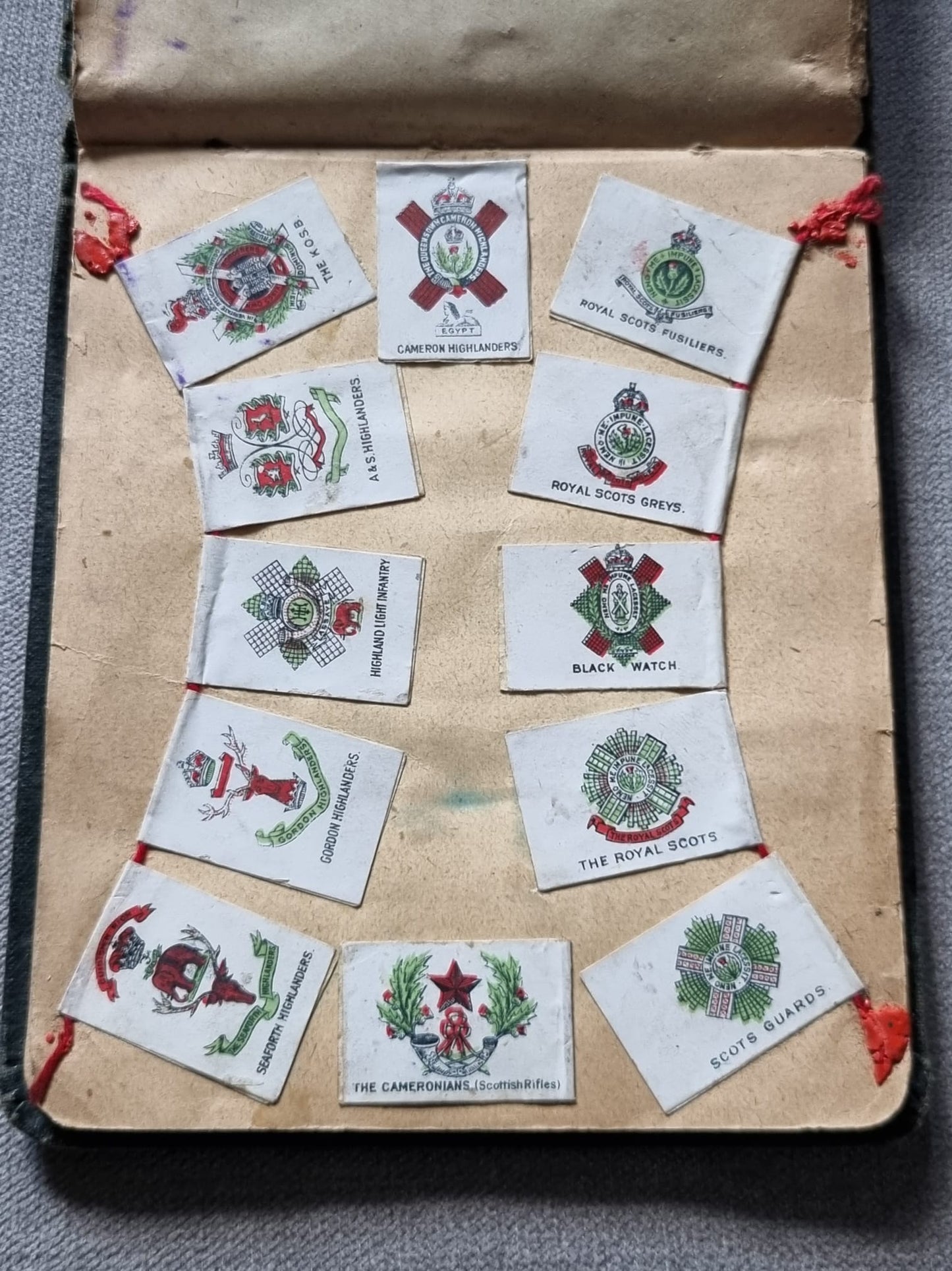 SOLD! Unique WW1 British Soldier’s Scrapbook/Photo and Penny Flag Album, with Cartoons