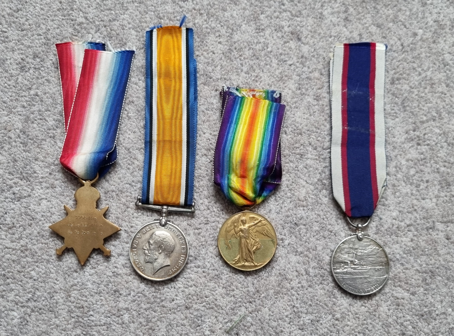 SOLD! WW1 British Navy Long Service Medal Quartet to J E Legard