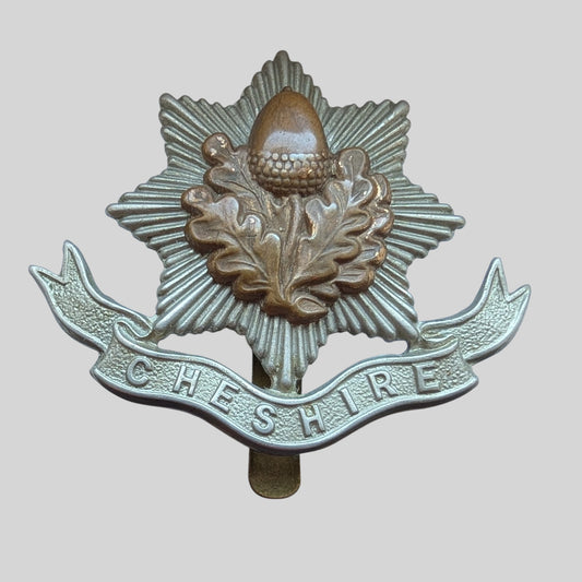 WW1 Cheshire Regiment Bimetal First Pattern  Cap Badge