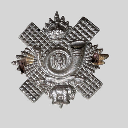 Highland Light Infantry Territorials Short Scroll White Metal Cap Badge
