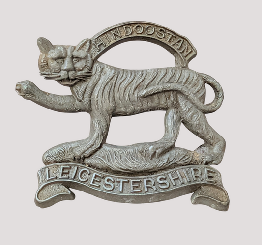 WW2 Plastic Economy Leicestershire Regiment Cap Badge with blades