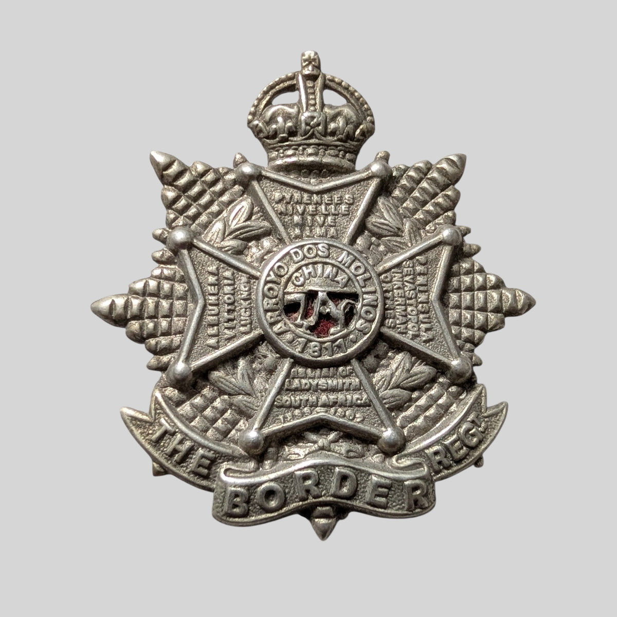 The Border Regiment Kings Crown Cap Badge