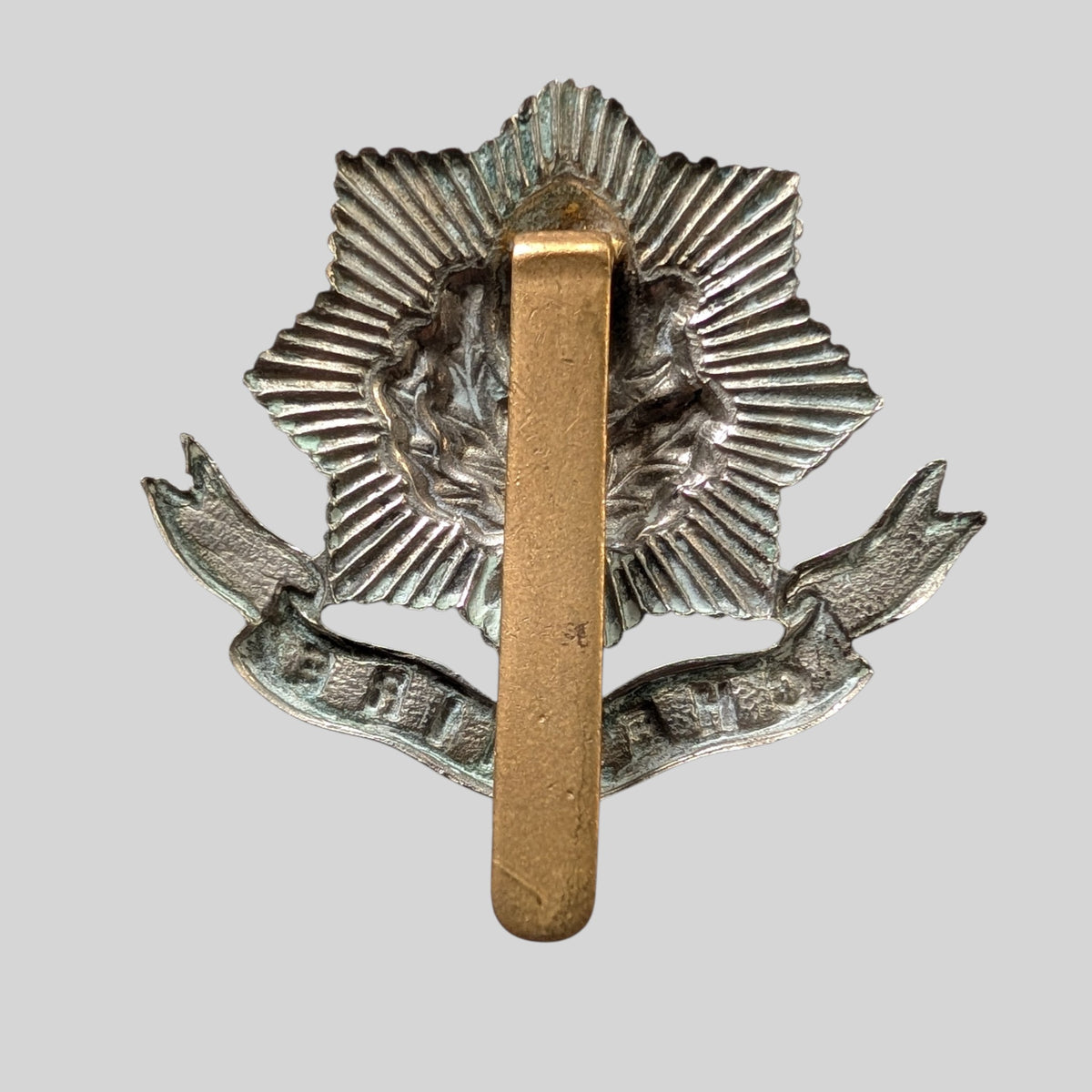 WW1 Cheshire Regiment Bimetal First Pattern  Cap Badge