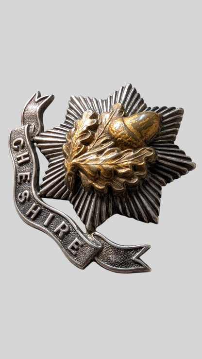 WW1 Era Cheshire Regiment Officer's Silver / Bimetal Cap Badge