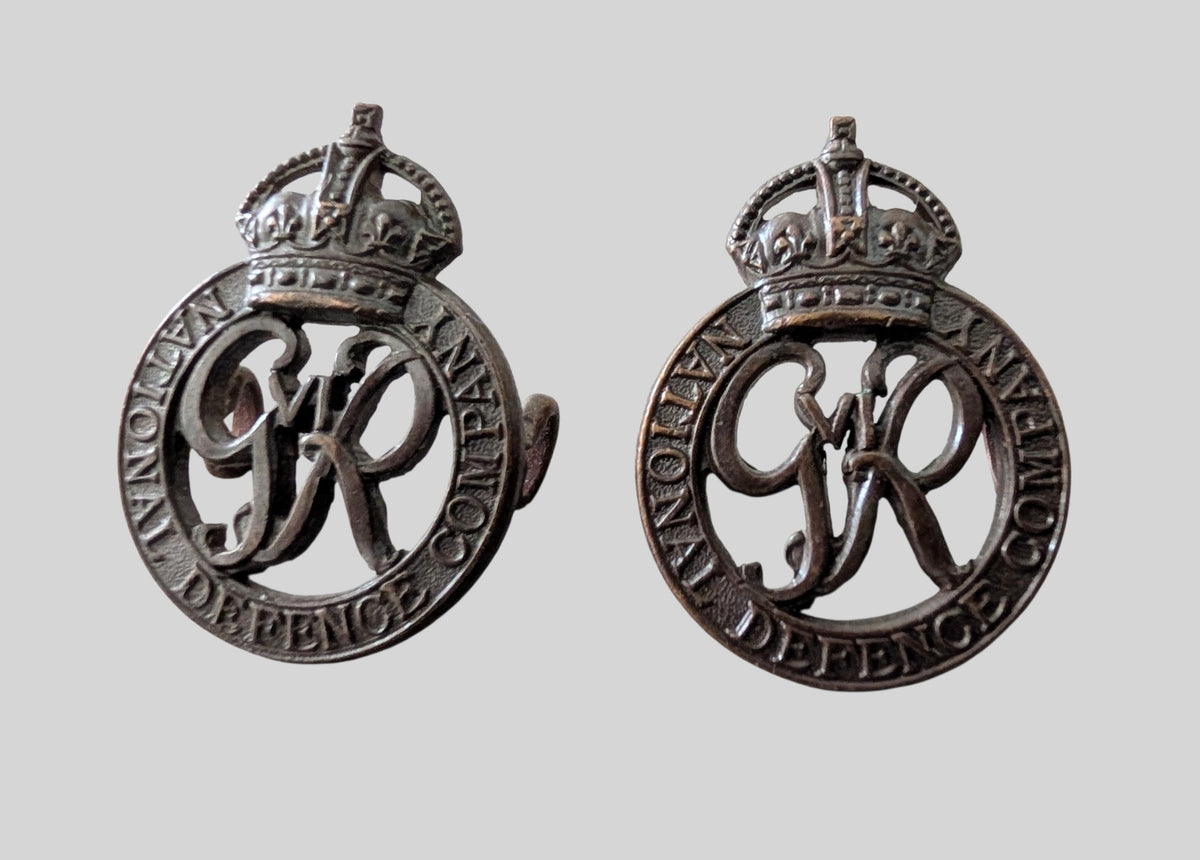 WW2 National Defence Company Bronze Collar Badge Pair
