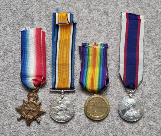 SOLD! WW1 British Navy Long Service Medal Quartet to J E Legard