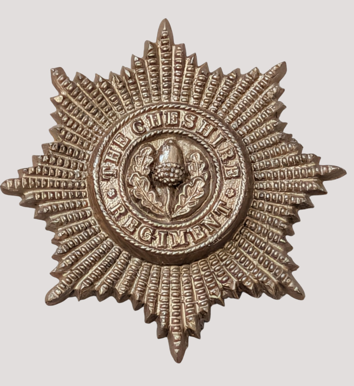 WW2 Plastic Economy The Cheshire Regiment Cap Badge with blades