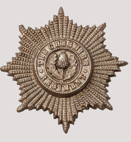 WW2 Plastic Economy The Cheshire Regiment Cap Badge with blades