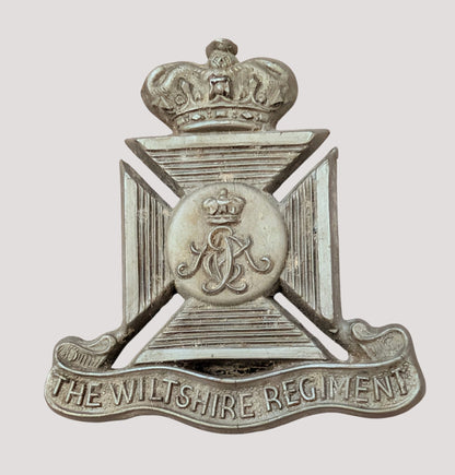 WW2 Plastic Economy Wiltshire Regiment Cap Badge with blades