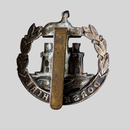 WW1 Era Dorsetshire Regiment Bimetal Cap Badge